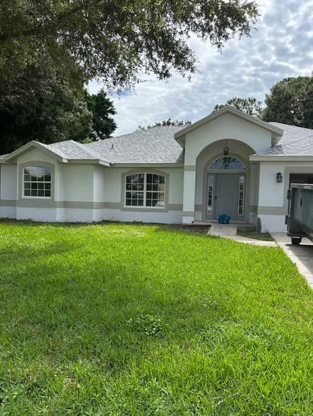 Finished white and gray exterior on a Treasure Coast ranch